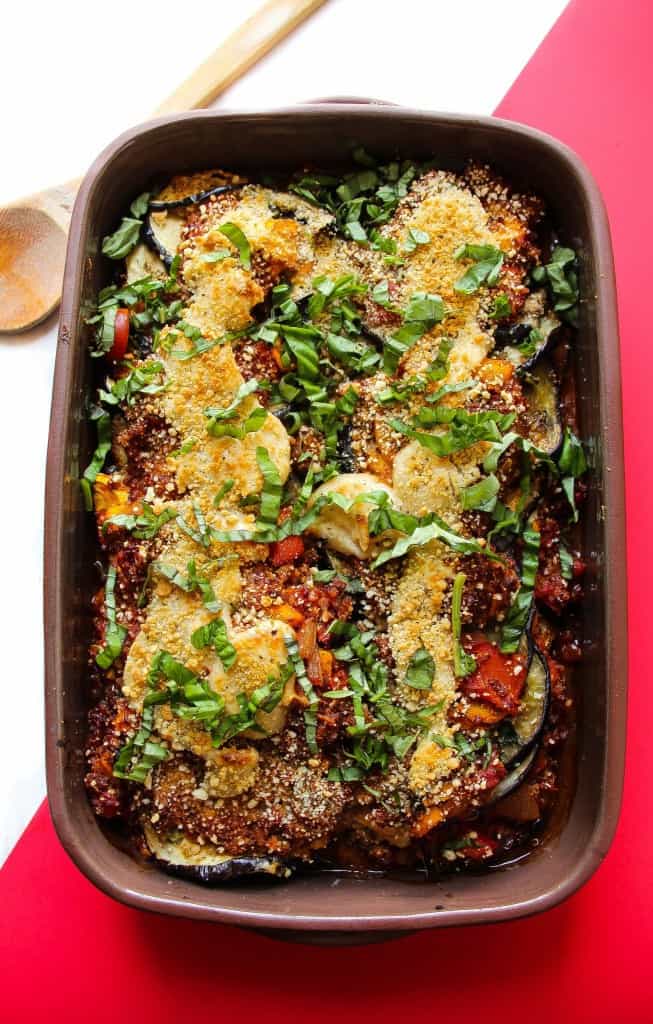 Vegan Eggplant Parmesan baked and served with fresh basil