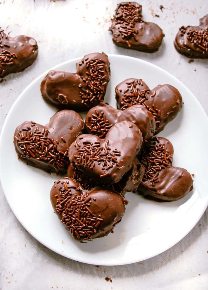 Heart shaped homemade oreo truffles on a plate