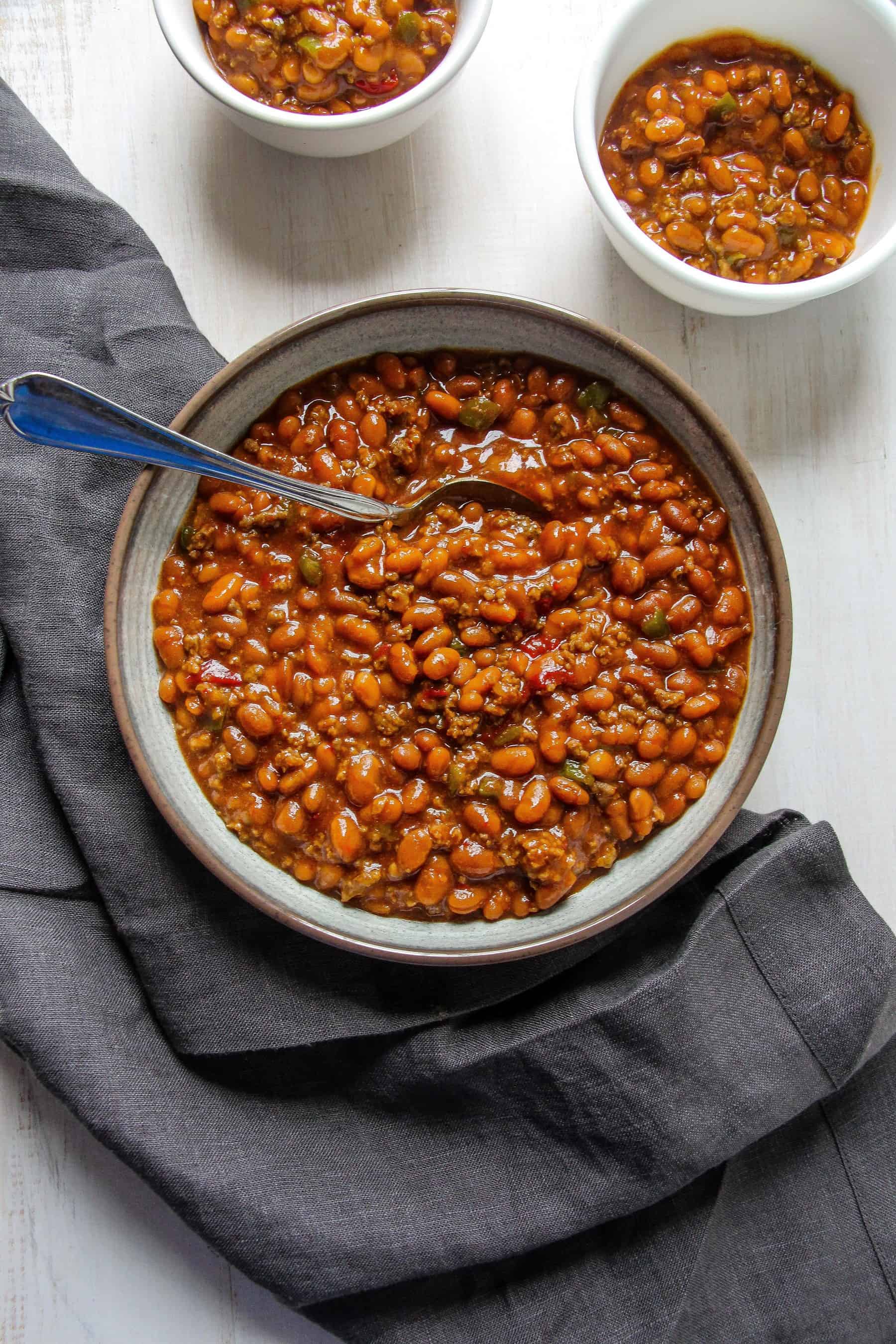 Southern baked beans plated in a bowl