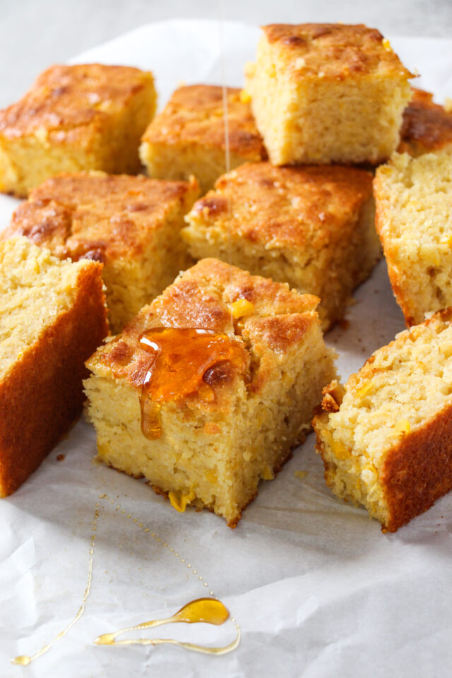 Gluten free cornbread, super moist, tender, and topped with extra honey