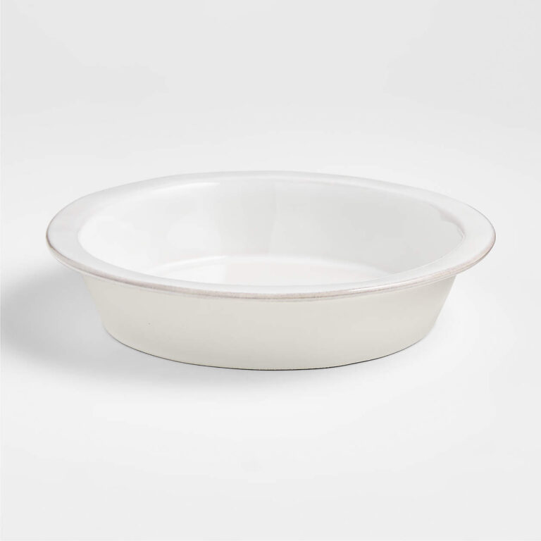A white circle pie dish with a rim around the top
