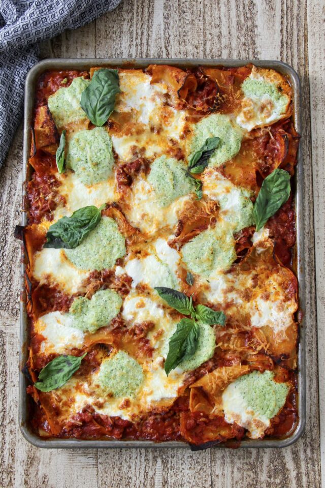Sheet Pan Lasagna topped with fresh basil