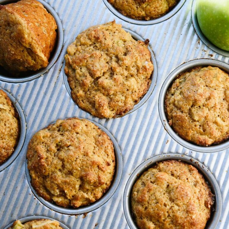 Apple muffins in a muffin tin after baking